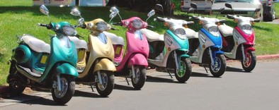 Six Vista E-Scooters Sitting in a Row