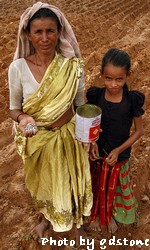 woman and daughter farming